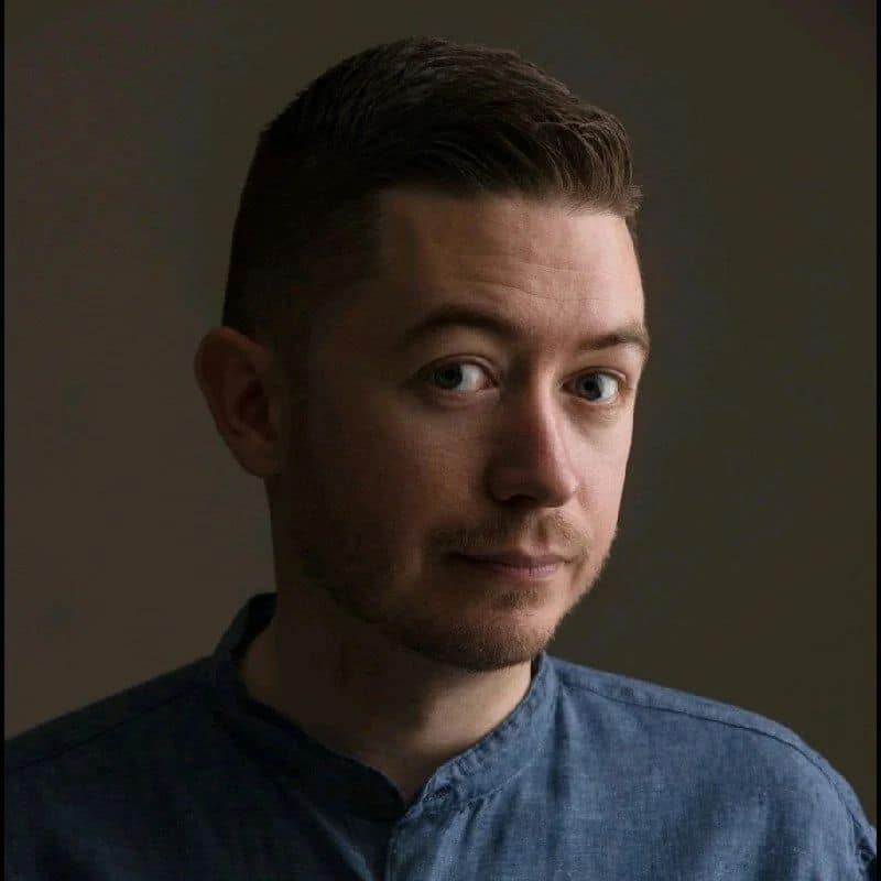 Headshot portrait of Henry, a team member